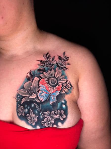 Color + Floral butterfly tattoo on Sternum by Ashley_Panda on TattMe