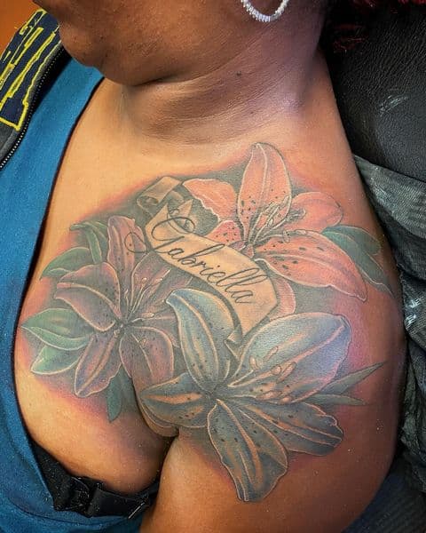 Floral + Lettering lilies tattoo on Shoulder by Ashley_Panda on TattMe