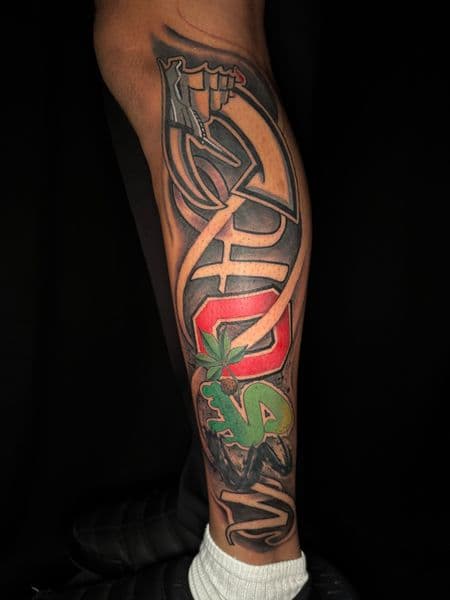 Color + Illustrative logo tattoo on Calf by Ashley_Panda on TattMe