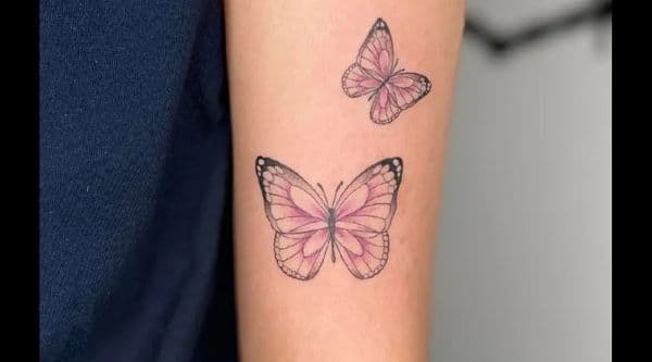 Fine Line + Color butterflies tattoo on Upper Arm by TattMe on TattMe