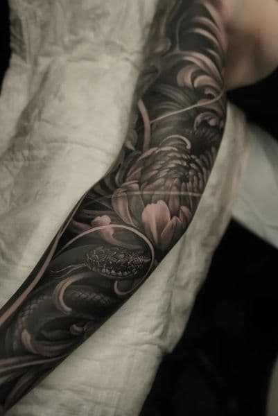 Black & Grey + Illustrative snake tattoo on Full Sleeve by Daniella on TattMe