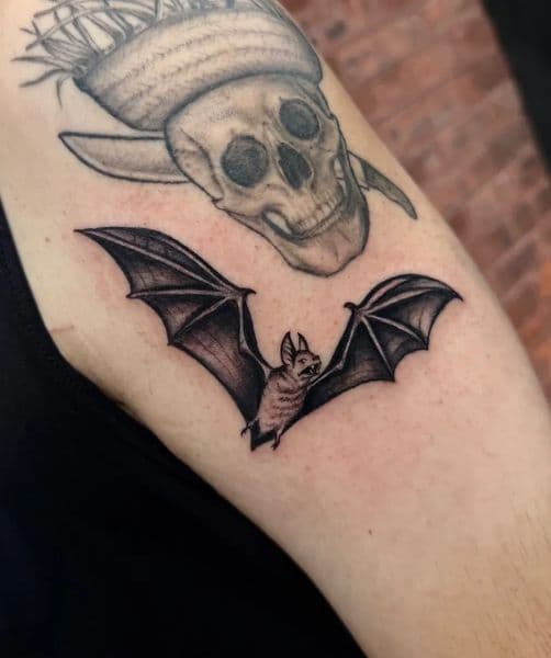 Black & Grey + Illustrative bat tattoo on Upper Arm by Miss_Vampira on TattMe