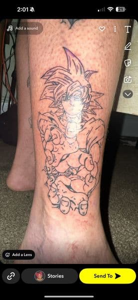 Anime + Line-work goku tattoo on Calf by kingandqueentatz on TattMe