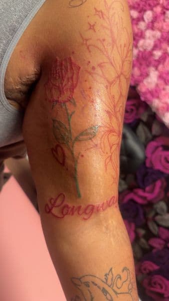 Line-work + Floral rose tattoo on Upper Arm by kingandqueentatz on TattMe