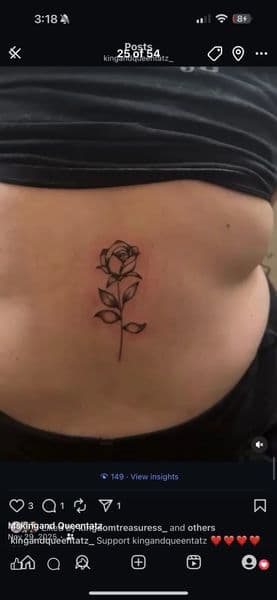Fine Line + Black-work rose tattoo on Lower Back by kingandqueentatz on TattMe