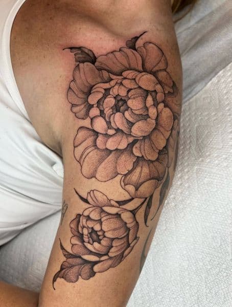 Black & Grey + Floral peonies tattoo on Upper Arm by coreink on TattMe