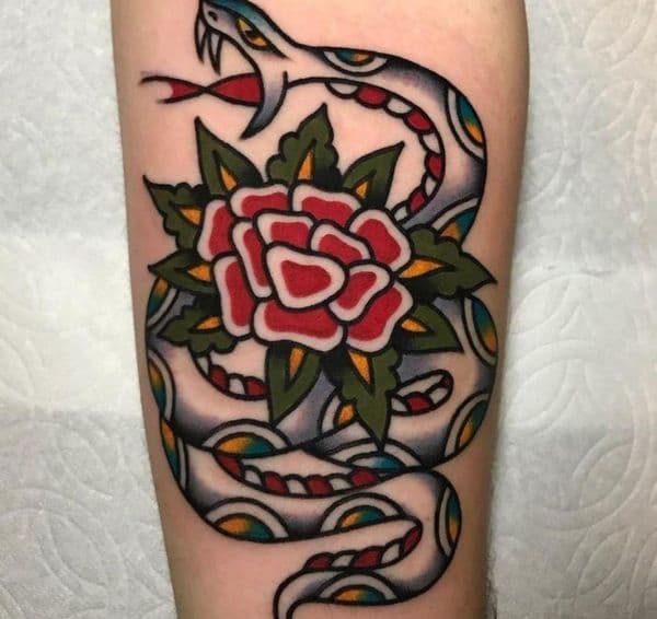 Traditional + American Traditional snake tattoo on Forearm by Urban_Ink_Studio_ on TattMe