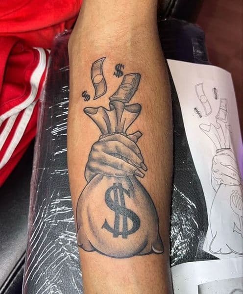 Black & Grey + Illustrative money bag tattoo on Forearm by devil_tats_999 on TattMe
