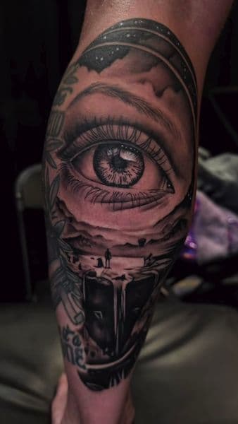 Black & Grey + Realism eye tattoo on Calf by trendellatattoos on TattMe