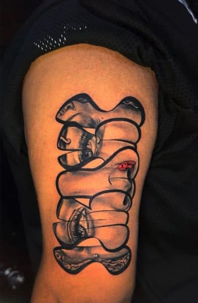 Black & Grey + Surrealism face tattoo on Upper Arm by trendellatattoos on TattMe