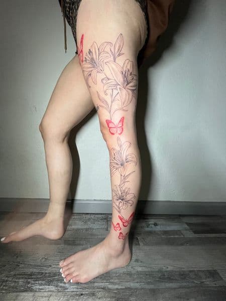 Floral + Fine Line lilies tattoo on Full Leg Sleeve by thesharkmarcel on TattMe