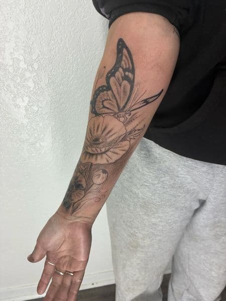 Black & Grey + Floral butterfly tattoo on Forearm by thesharkmarcel on TattMe