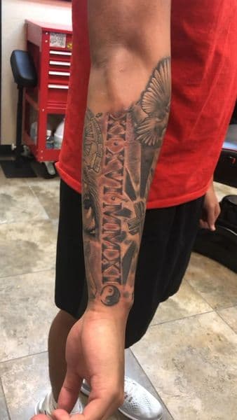 Black & Grey + Realism roman numerals tattoo on Forearm by oliva on TattMe