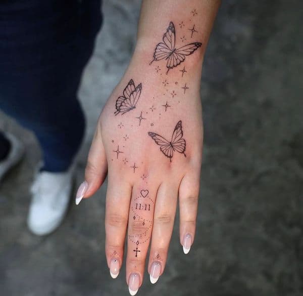Fine Line + Black-work butterflies tattoo on Hand by Bang_Bang_Tattoo on TattMe