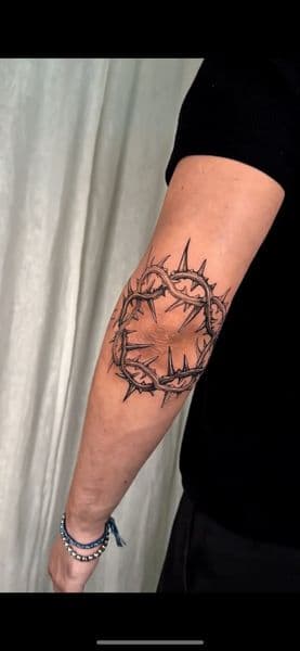 Black & Grey + Illustrative crown of thorns tattoo on Elbow by Insane_Ink_Studio_ on TattMe