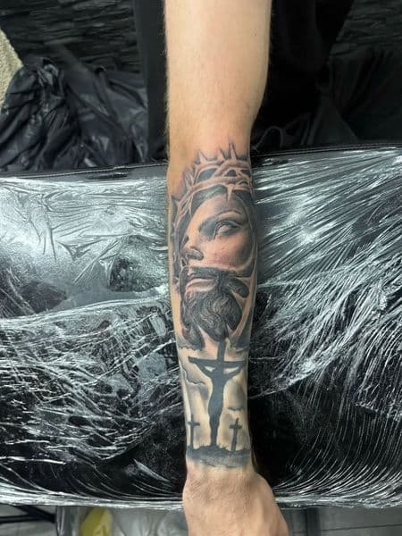 Black & Grey + Realism jesus tattoo on Forearm by Insane_Ink_Studio_ on TattMe