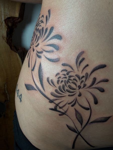 Black-work + Floral chrysanthemums tattoo on Ribs by Ana_Cloud on TattMe