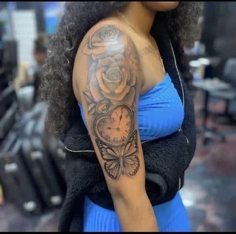 Black & Grey + Illustrative roses tattoo on Upper Arm by InkByArtie_The_Brand on TattMe