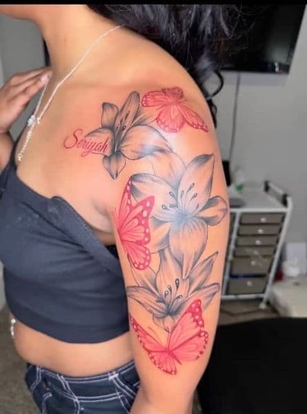 Floral + Color flowers tattoo on Upper Arm by InkByArtie_The_Brand on TattMe