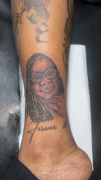 Portrait + Realism portrait tattoo on Ankle by the_goat_images_ on TattMe