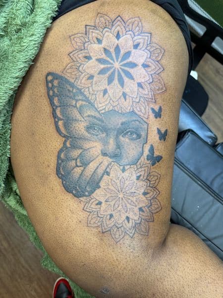 Black & Grey + Mandala face tattoo on Thigh by INKBYKIMCHI on TattMe