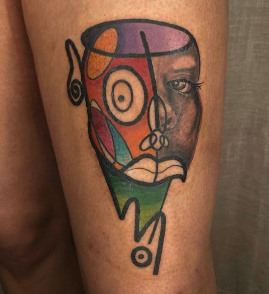 Abstract + Color face tattoo on Thigh by jahnovatattoo on TattMe