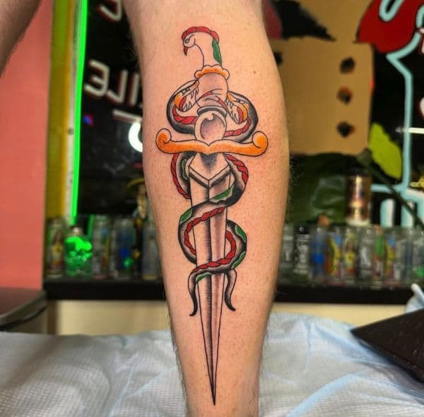 American Traditional + Color dagger tattoo on Calf by jahnovatattoo on TattMe