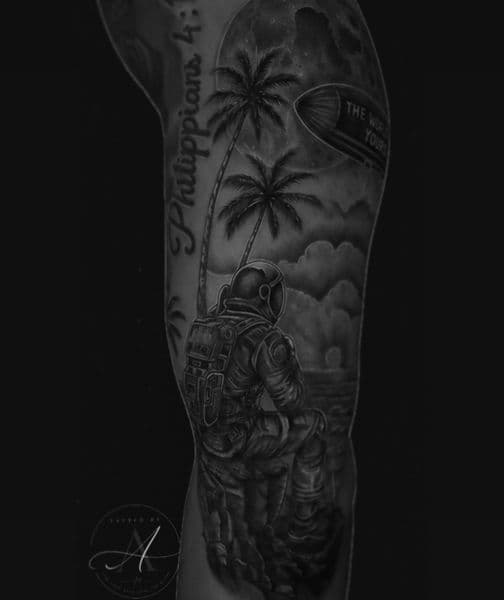 Black & Grey + Realism astronaut tattoo on Upper Arm by tattedby_A on TattMe