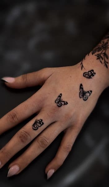 Fine Line + Black-work butterflies tattoo on Hand by tattedby_A on TattMe
