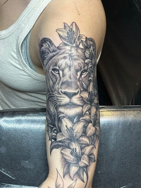 Black & Grey + Realism lioness tattoo on Upper Arm by l_allen_tattoos on TattMe