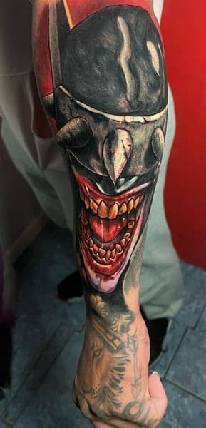 Color + Realism batman who laughs tattoo on Forearm by l_allen_tattoos on TattMe