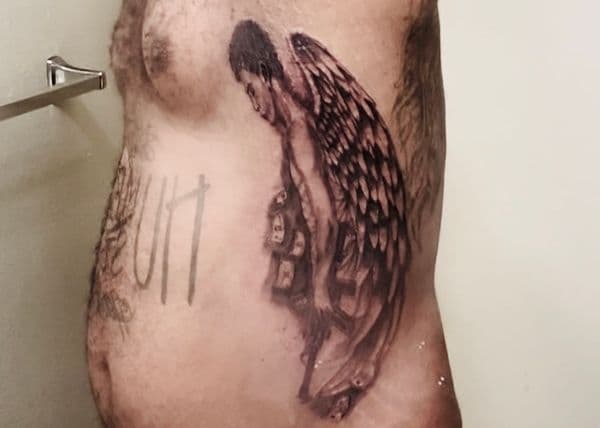 Black & Grey + Illustrative Realism angel tattoo on Ribs by 008ink on TattMe