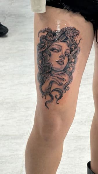 Black & Grey + Realism medusa tattoo on Thigh by 8balltattoo on TattMe