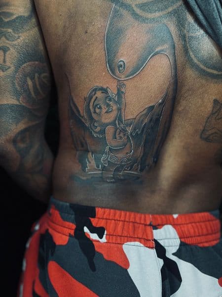 Cartoon + Illustrative baby tattoo on Lower Back by tatt__artistkey on TattMe