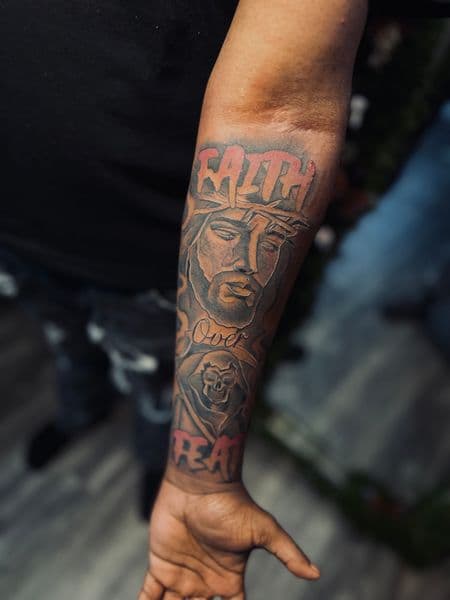 Black & Grey + Lettering jesus tattoo on Forearm by tatt__artistkey on TattMe