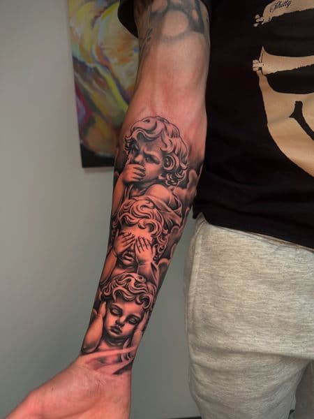 Black & Grey + Realism cherubs tattoo on Forearm by tatsbyallen on TattMe