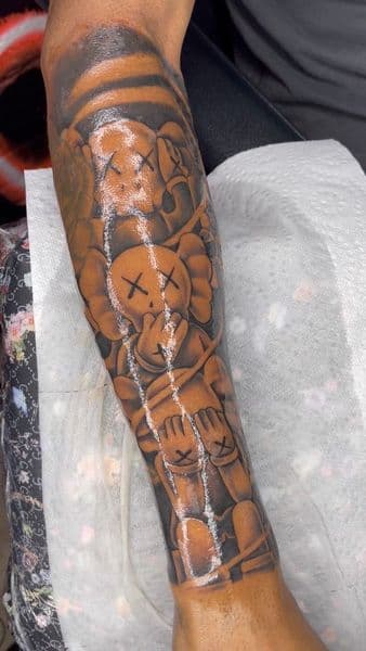 Illustrative + Pop Culture kaws tattoo on Forearm by jayden on TattMe
