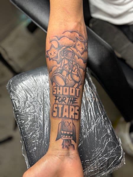Black & Grey + Illustrative astronaut tattoo on Forearm by jayden on TattMe