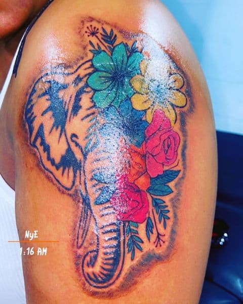 Color + Illustrative elephant tattoo on Shoulder by Dcmbrs_finest on TattMe