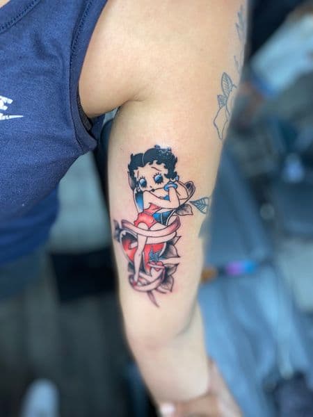 American Traditional + Cartoon betty boop tattoo on Upper Arm by Dcmbrs_finest on TattMe