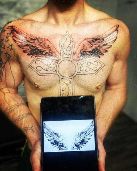 Black & Grey + Realism wings tattoo on Chest by Dcmbrs_finest on TattMe