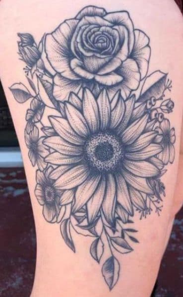 Floral + Black & Grey rose tattoo on Thigh by Dcmbrs_finest on TattMe