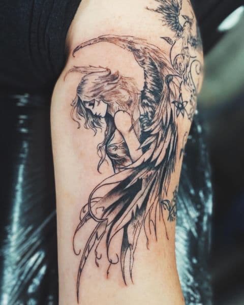 Black & Grey + Illustrative angel tattoo on Upper Arm by Dcmbrs_finest on TattMe