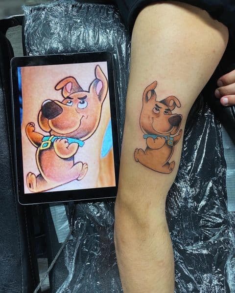 Cartoon + Color scrappy doo tattoo on Thigh by Dcmbrs_finest on TattMe