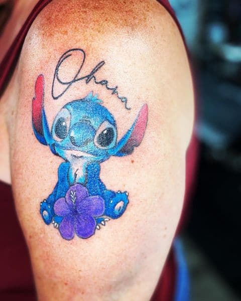 Color + Cartoon stitch tattoo on Upper Arm by Dcmbrs_finest on TattMe