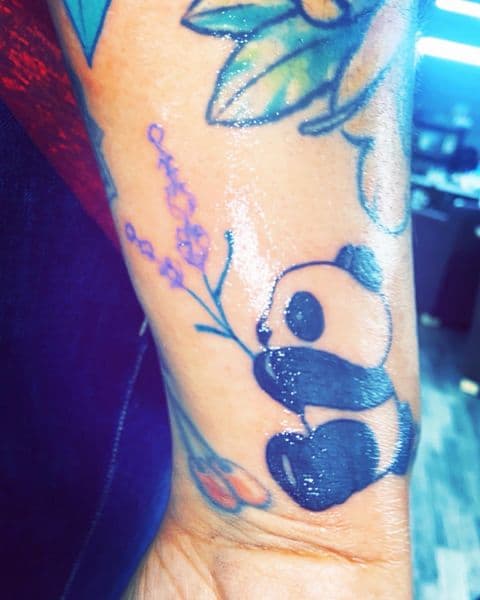 Fine Line + Illustrative panda tattoo on Wrist by Dcmbrs_finest on TattMe