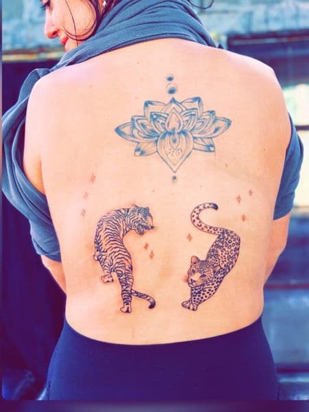 Fine Line + Dot-work lotus tattoo on Upper Back by Dcmbrs_finest on TattMe