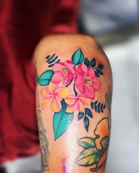 Color + Floral flowers tattoo on Upper Arm by Dcmbrs_finest on TattMe