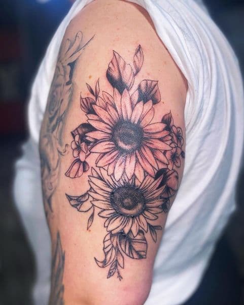 Black & Grey + Floral sunflowers tattoo on Upper Arm by Dcmbrs_finest on TattMe
