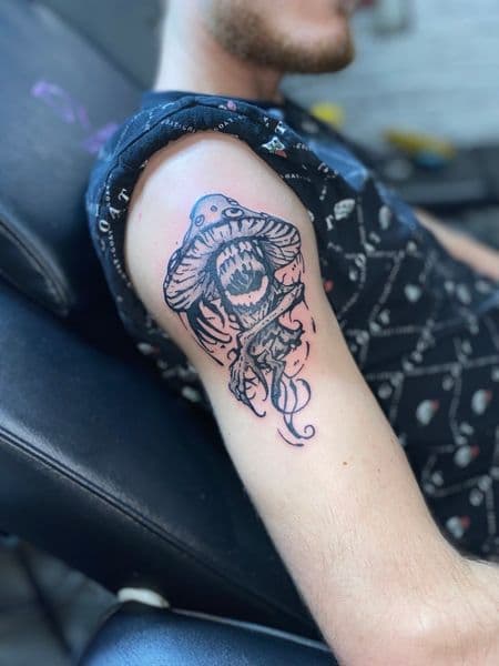 Black-work + Illustrative mushroom tattoo on Upper Arm by Dcmbrs_finest on TattMe